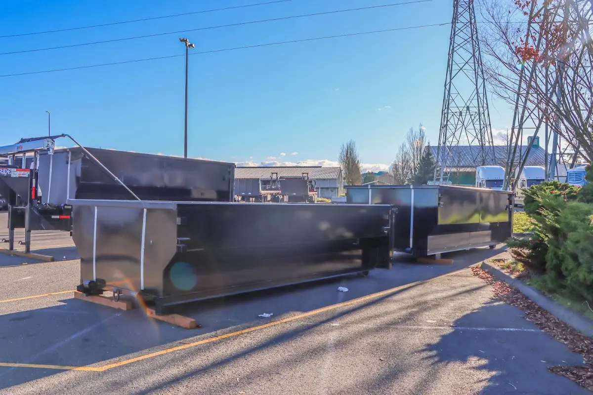 Roll-off dumpster ready for waste disposal at job site for Residential Dumpster Rental in Paola